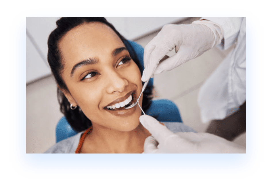 Black woman in dental chair getting general dentistry service