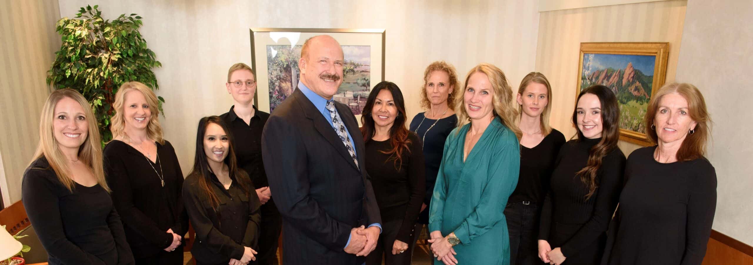 Team image of whole family dentistry staff