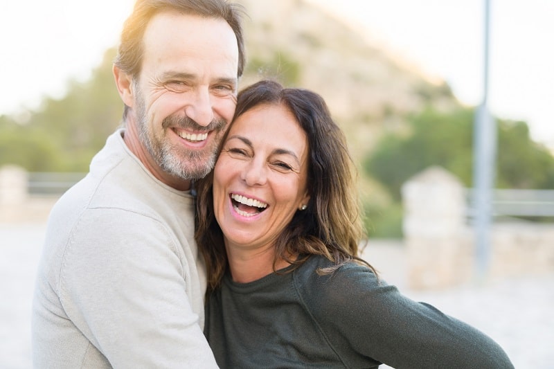 Image of a middle aged couple smiling