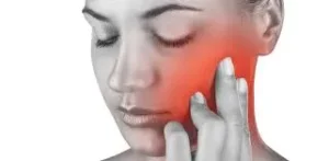 Illustration of a woman's face in pain due to TMD/TMJ issues